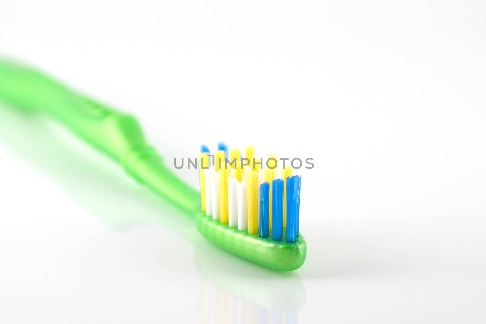 Tooth-brush over white. Shallow DOF