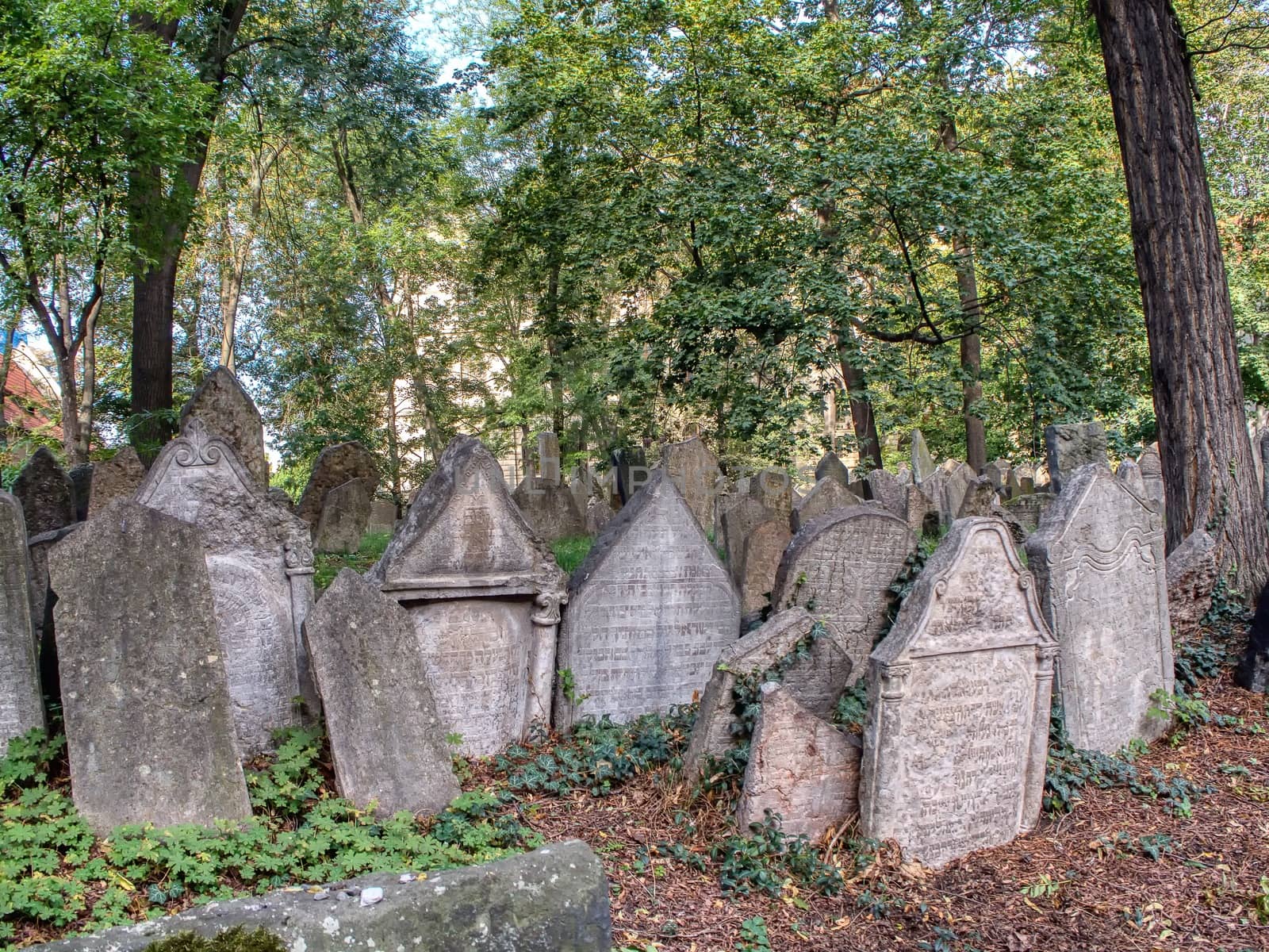 Tombstones on Old Jewish Cemetery in the Jewish Quarter in Prague. by CreativePhotoSpain