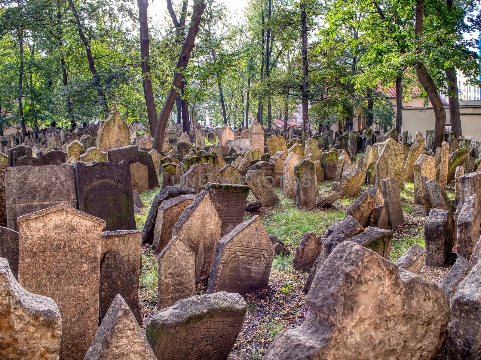 Tombstones on Old Jewish Cemetery in the Jewish Quarter in Prague. by CreativePhotoSpain