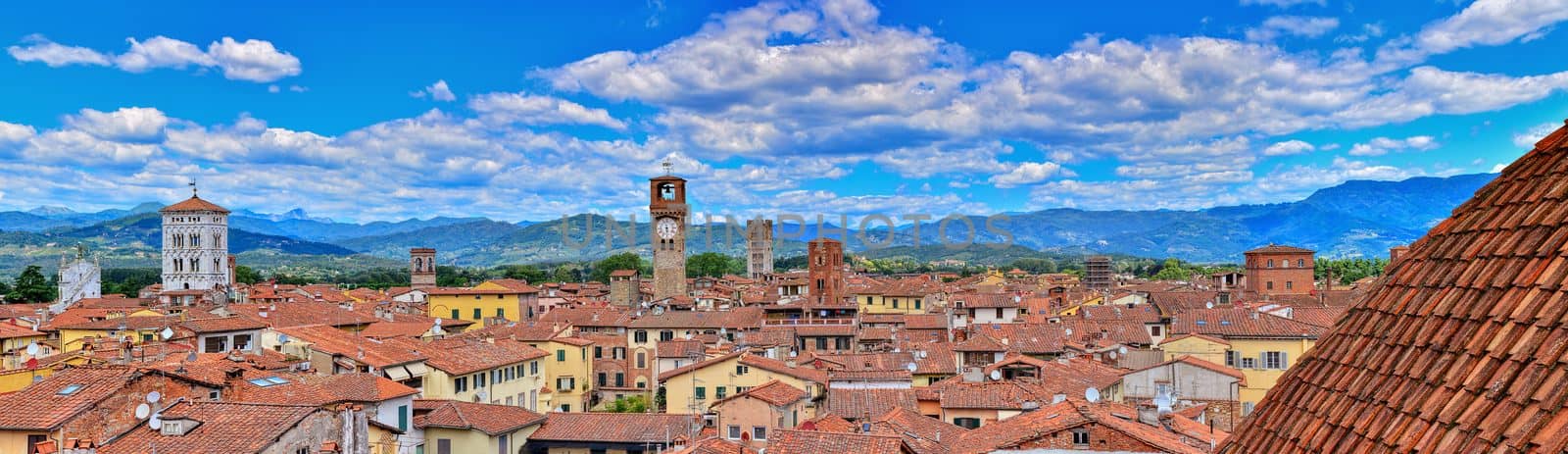 Lucca, Italy - June 26,2018: Beautiful medieval town Lucca in Tuscany. Houses with red roofs.