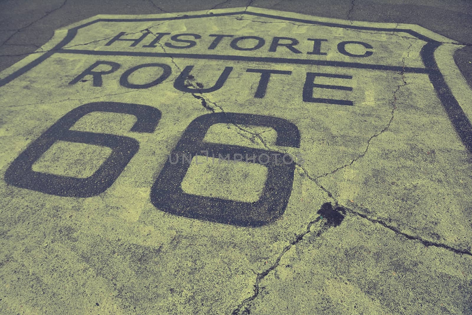 Sign of historic route 66 on the asphalt.