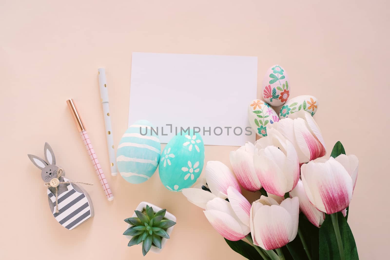 Happy Easter concept with blank card and colorful easter eggs an by nuchylee