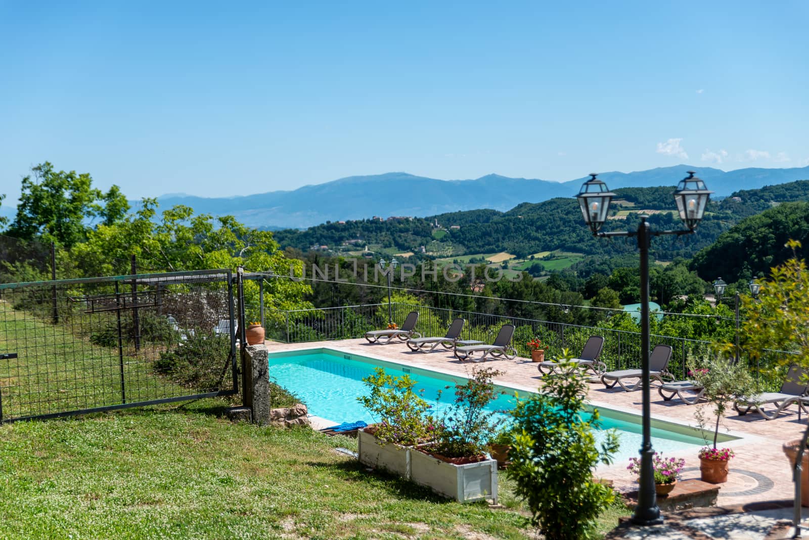 macerino,italy june 02 2020 :private macerino swimming pool with panoramic views