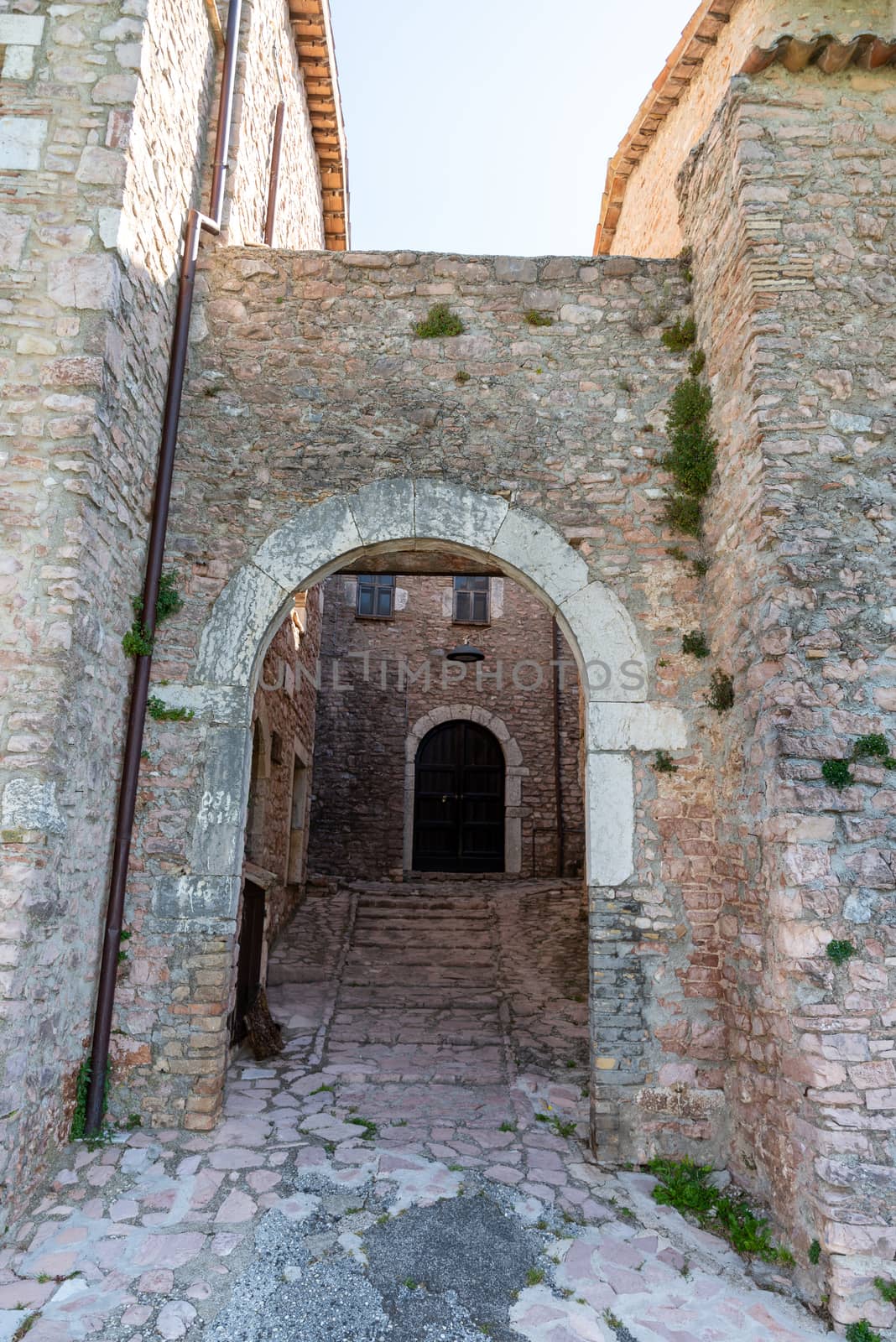 ancient village of macerino located on a mountain by carfedeph