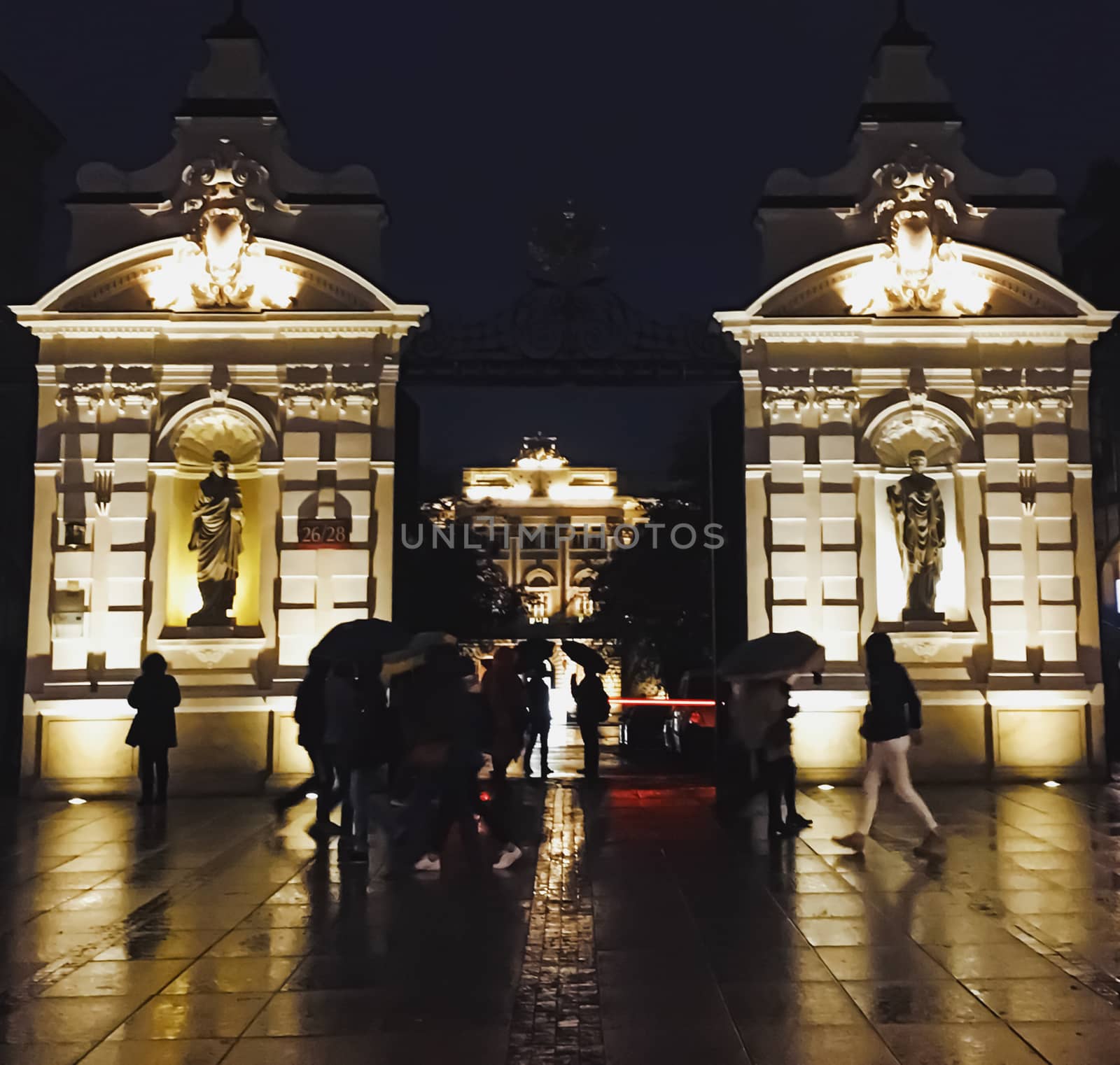 Exterior facade of classic building in the European city at night, architecture and design by Anneleven