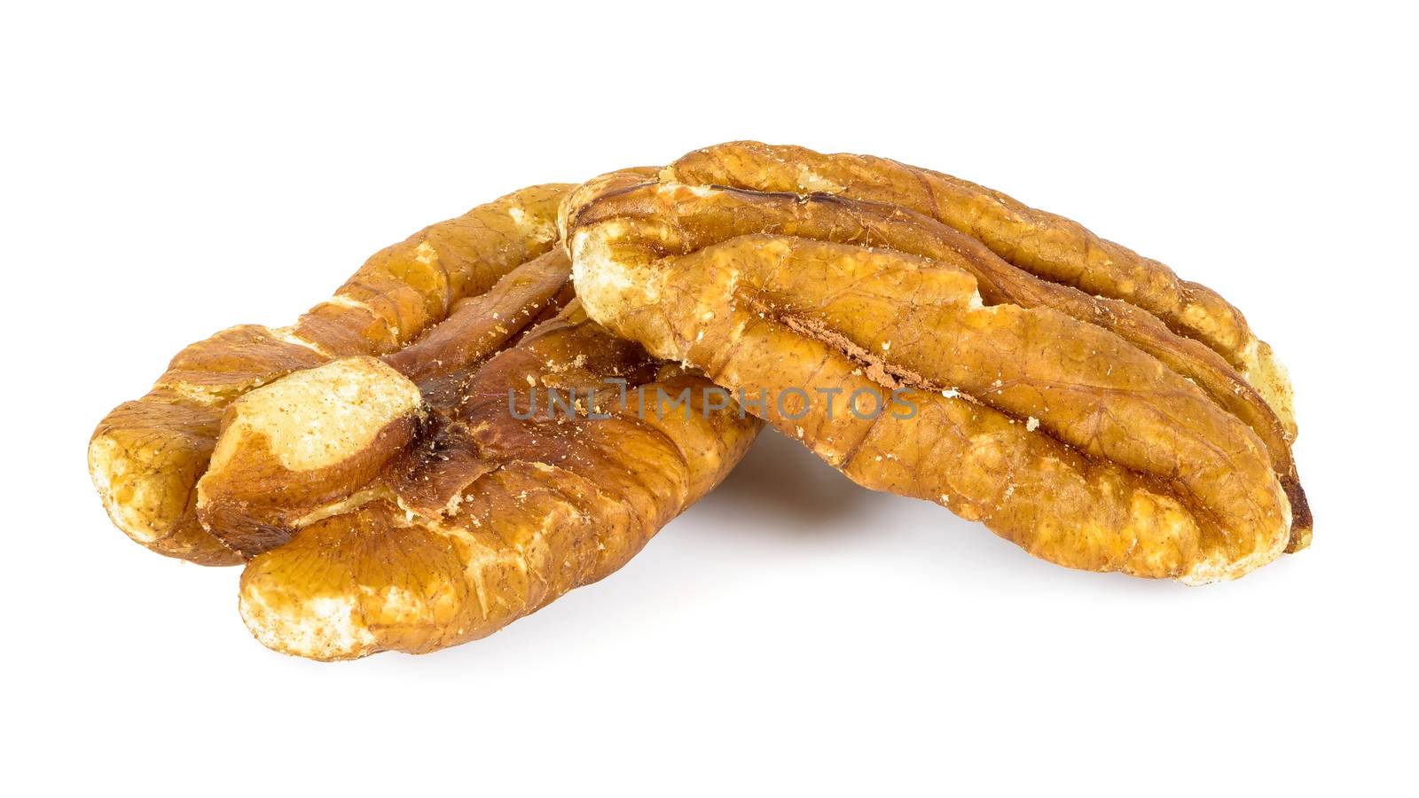 Close-up of pecan nuts isolated on white background with clipping path