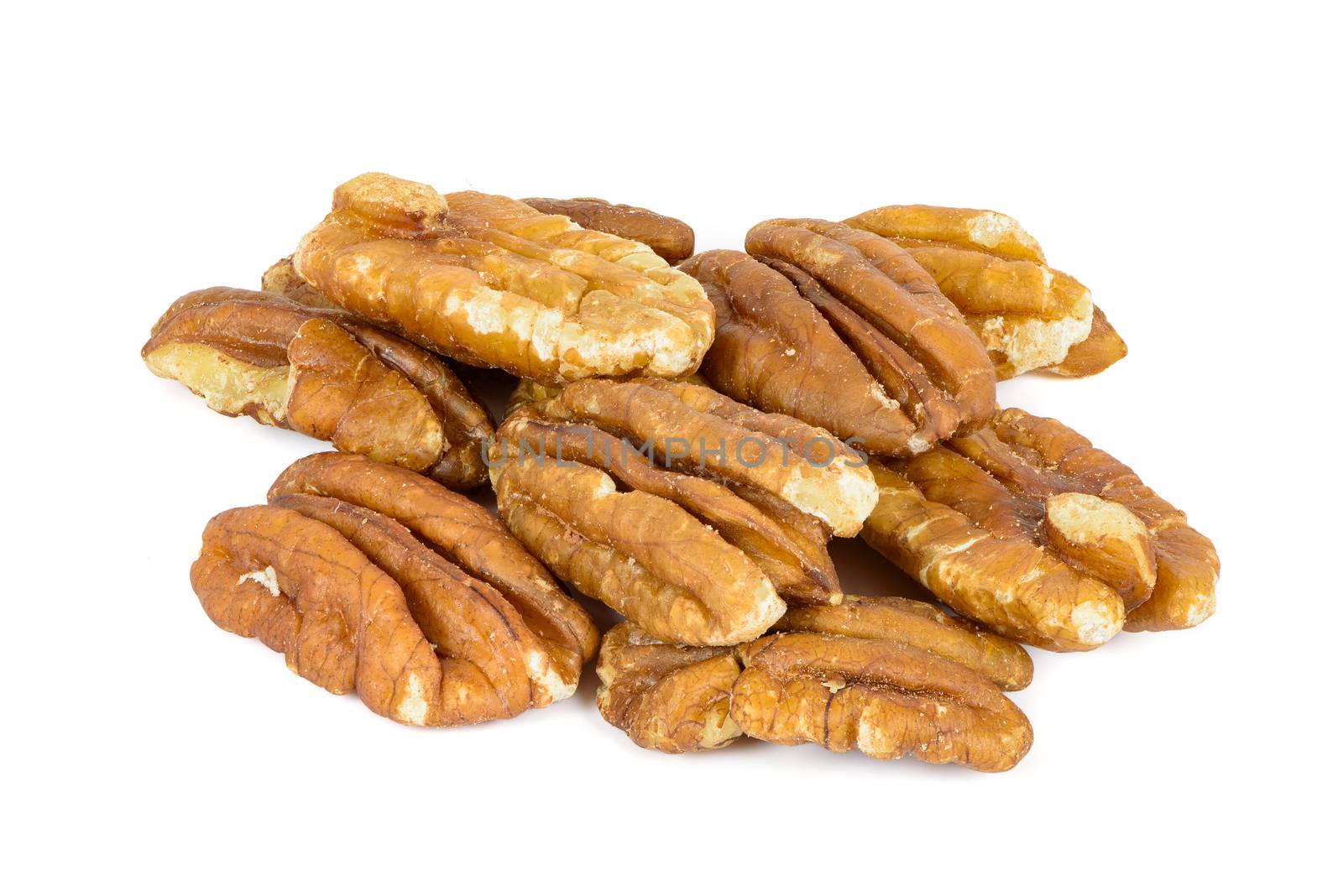 Heap of pecan nuts on white background by mkos83