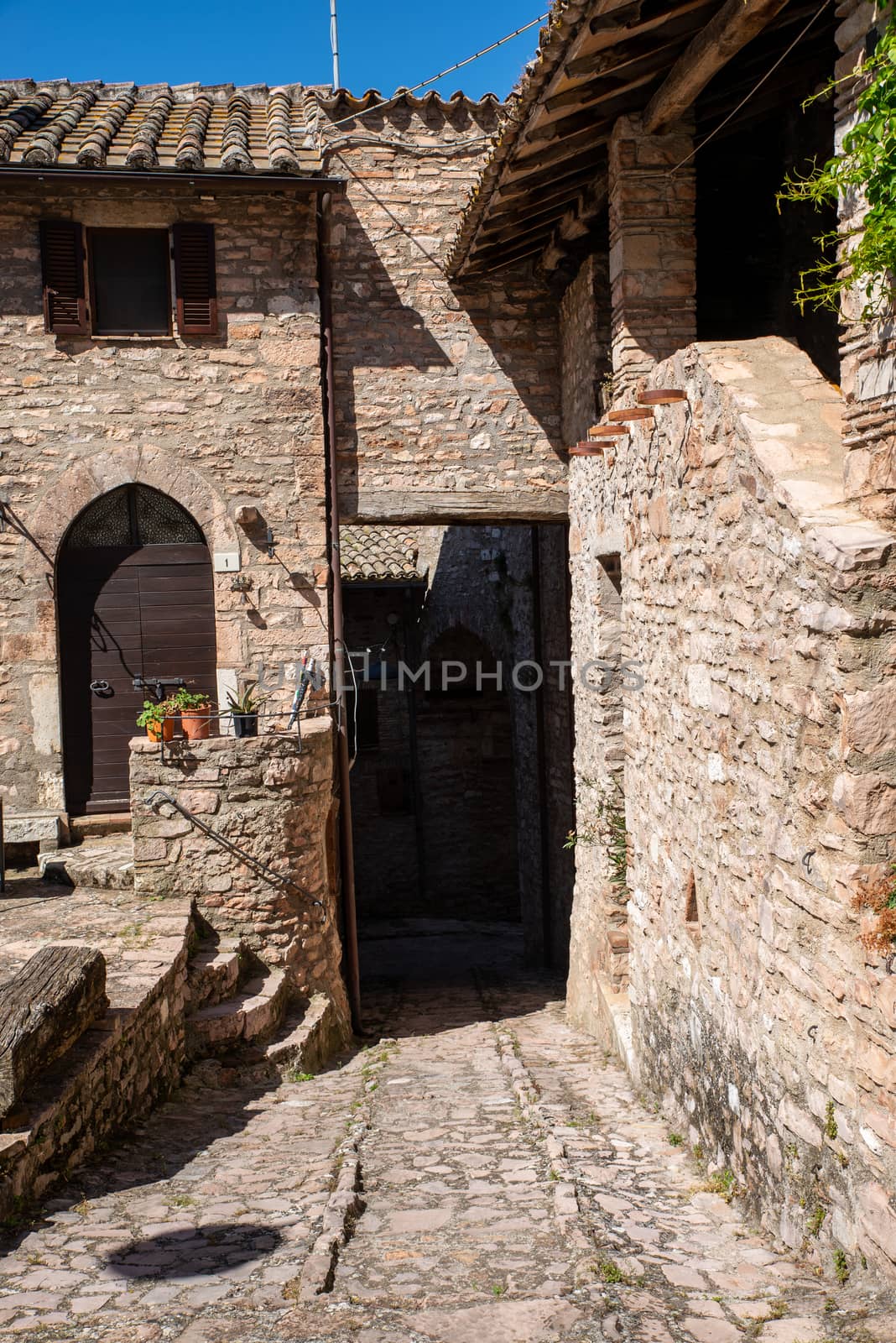 ancient village of macerino located on a mountain by carfedeph