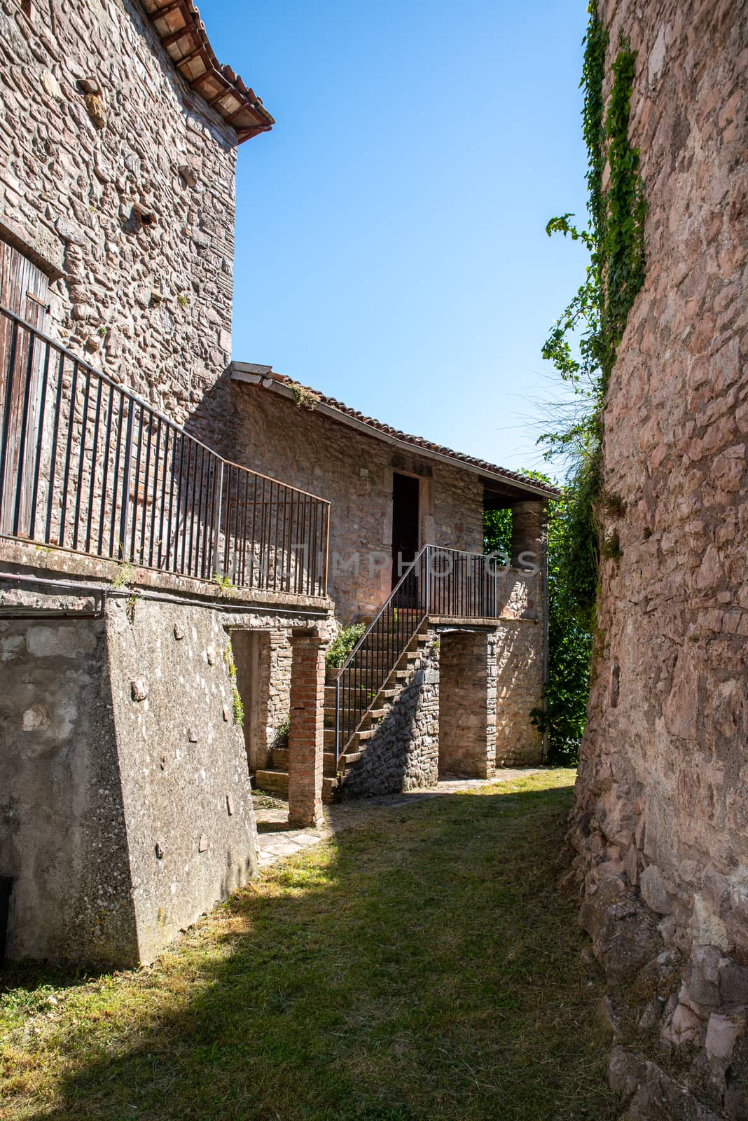 ancient village of macerino located on a mountain by carfedeph