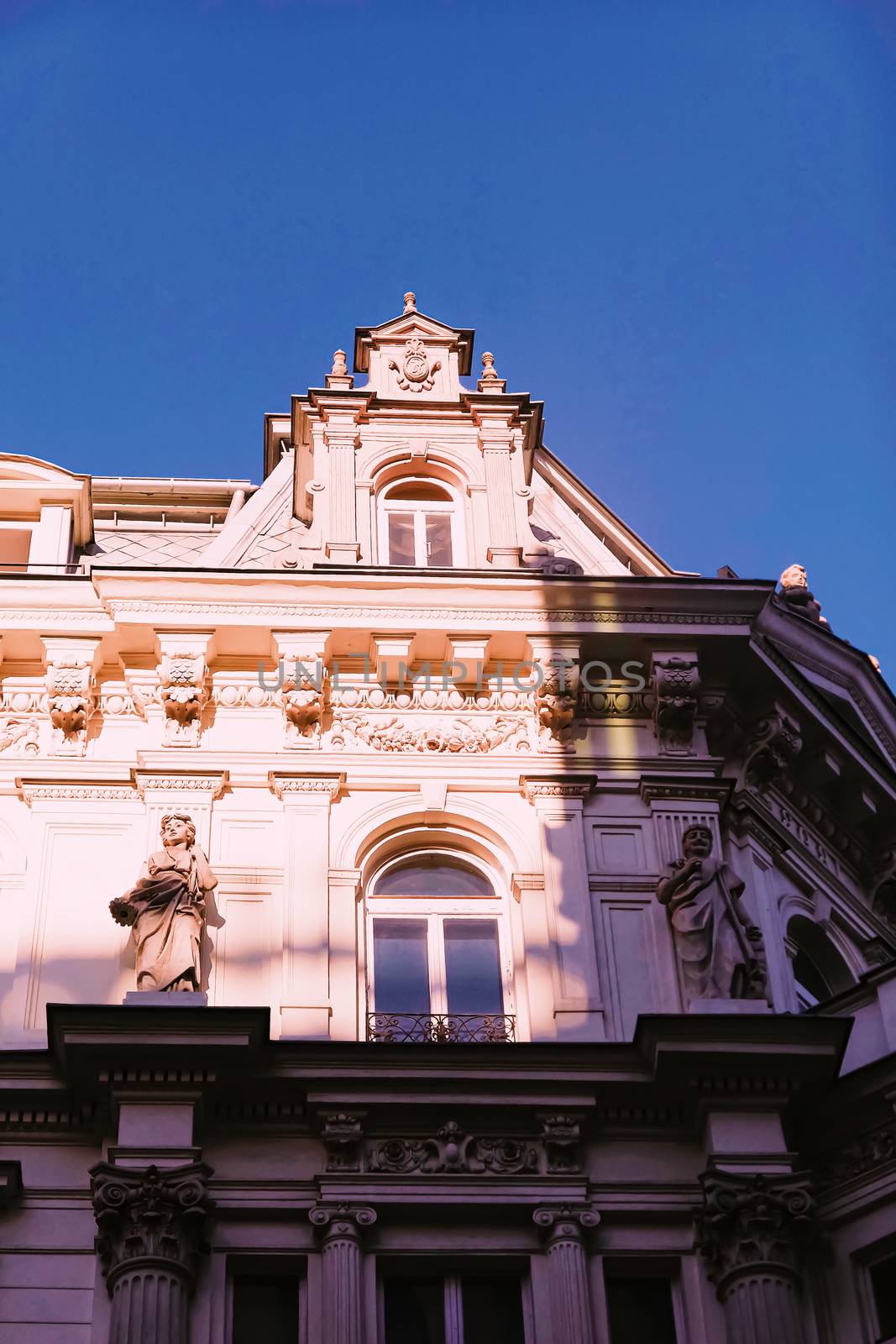 Exterior facade of classic building in the European city, architecture and design by Anneleven