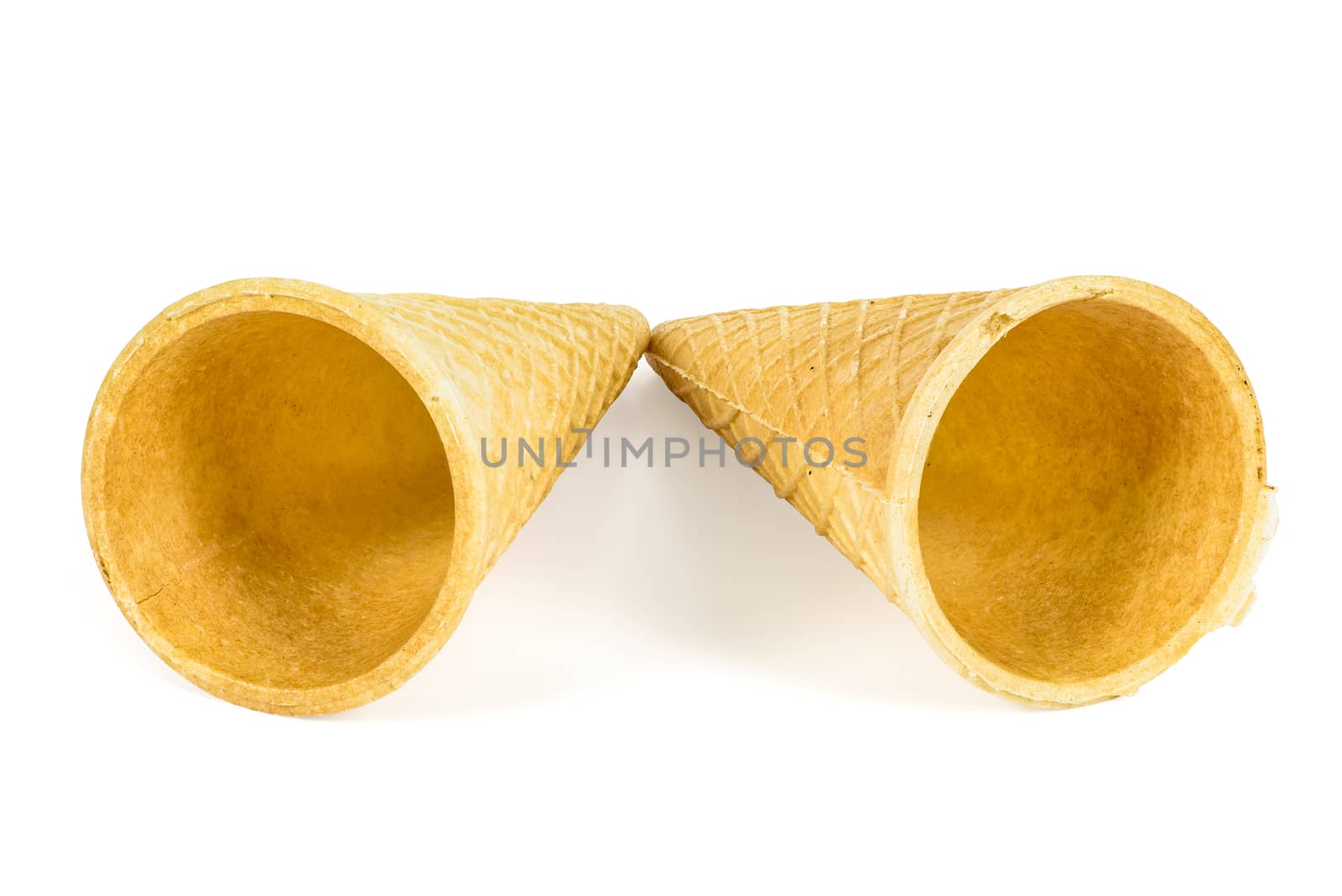 Two empty ice cream cones isolated on white background with clipping path