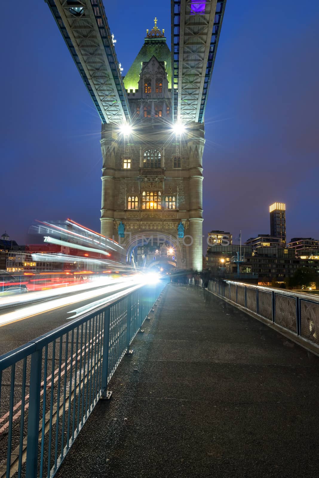 Tower Bridge with motion blurred car lights by mkos83