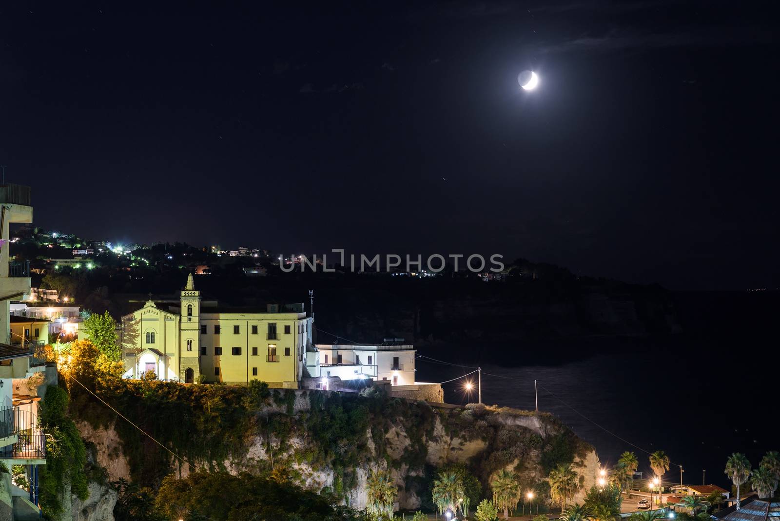 Buildings of Tropea town in the moon light, Calabria, Italy