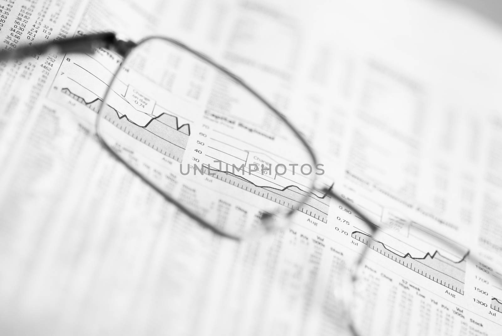 Glasses Over Financial Chart by dani3315