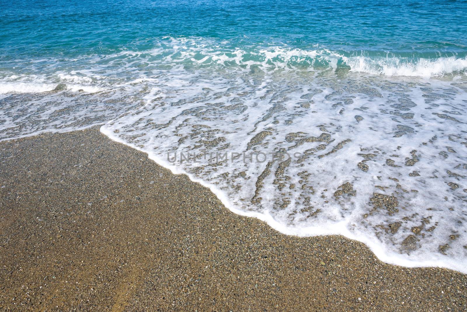 Summer background made of sea and gravel beach by mkos83