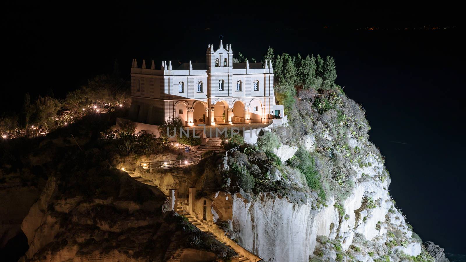 Sanctuary of Santa Maria Island in Tropea by night, Calabria, Italy