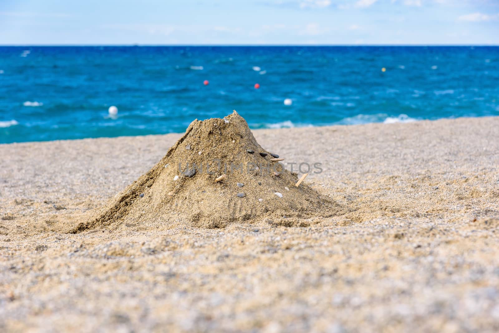 Volcano made from sand on the italian beach in Calabria