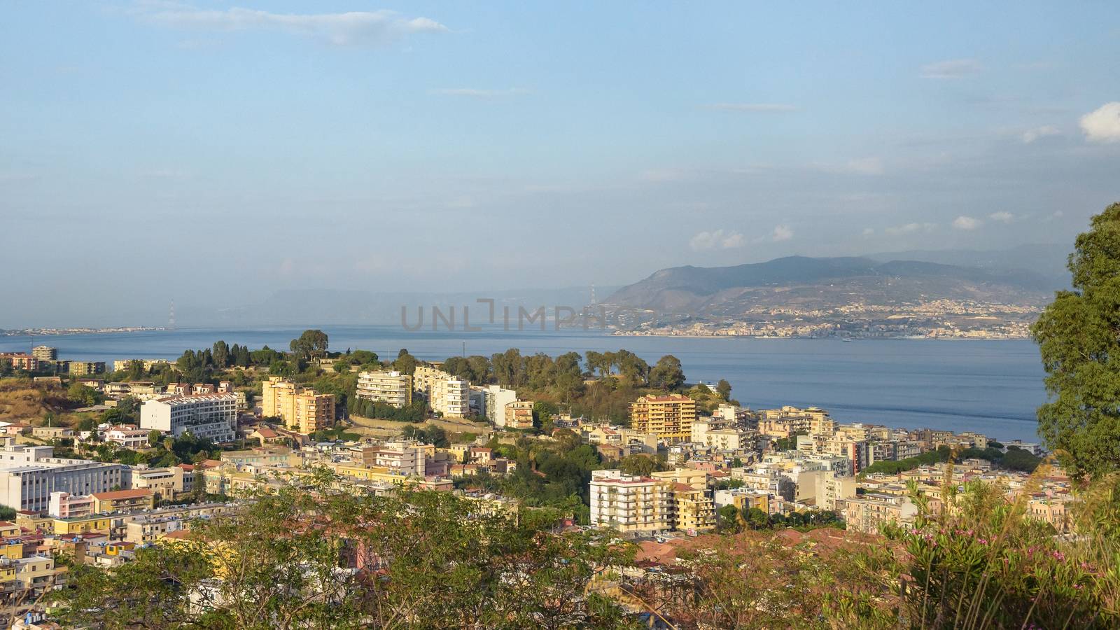 Afternoon view of Messina town with Messina strait in the background, Sicily, Italy