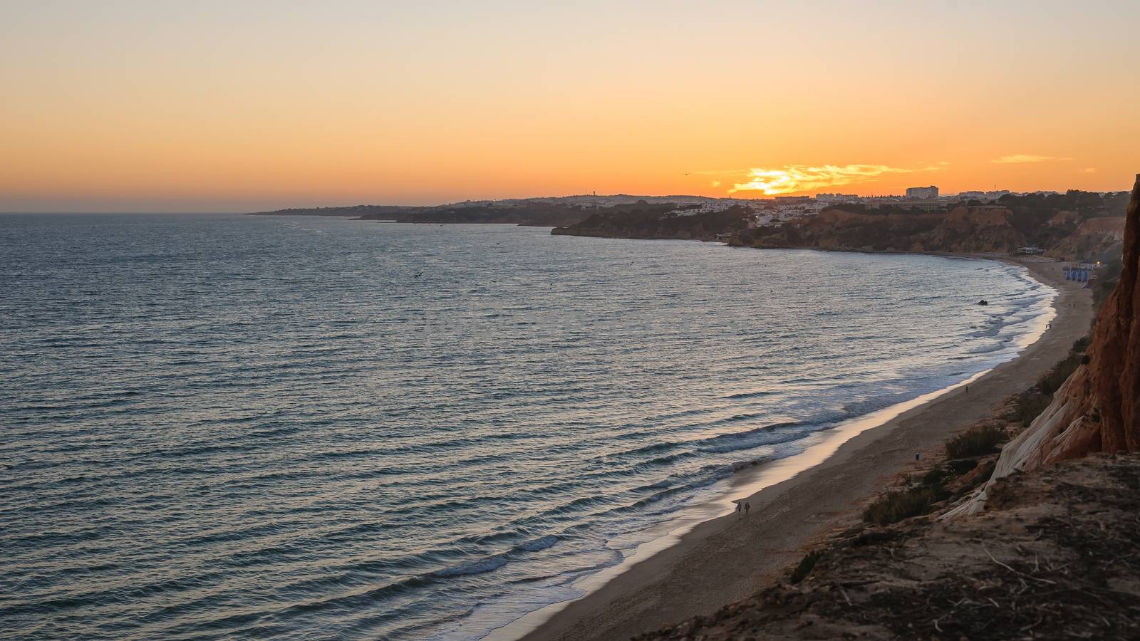 Atlantic coastline in Algarve region in Portugal at dusk