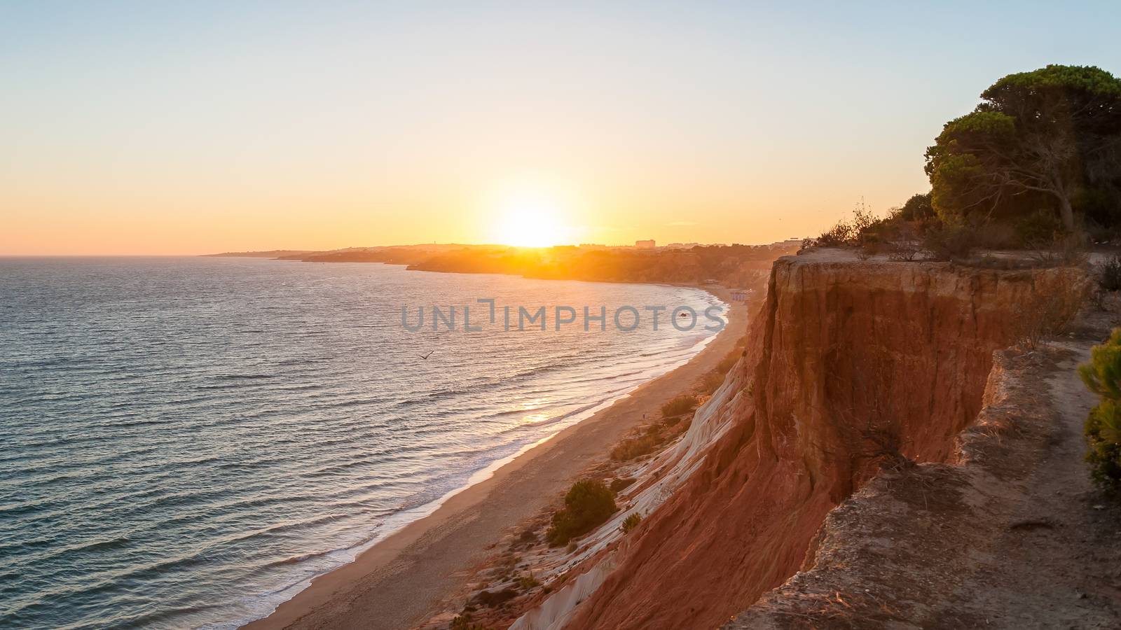 Falesia Beach seen from the cliff at sunset by mkos83