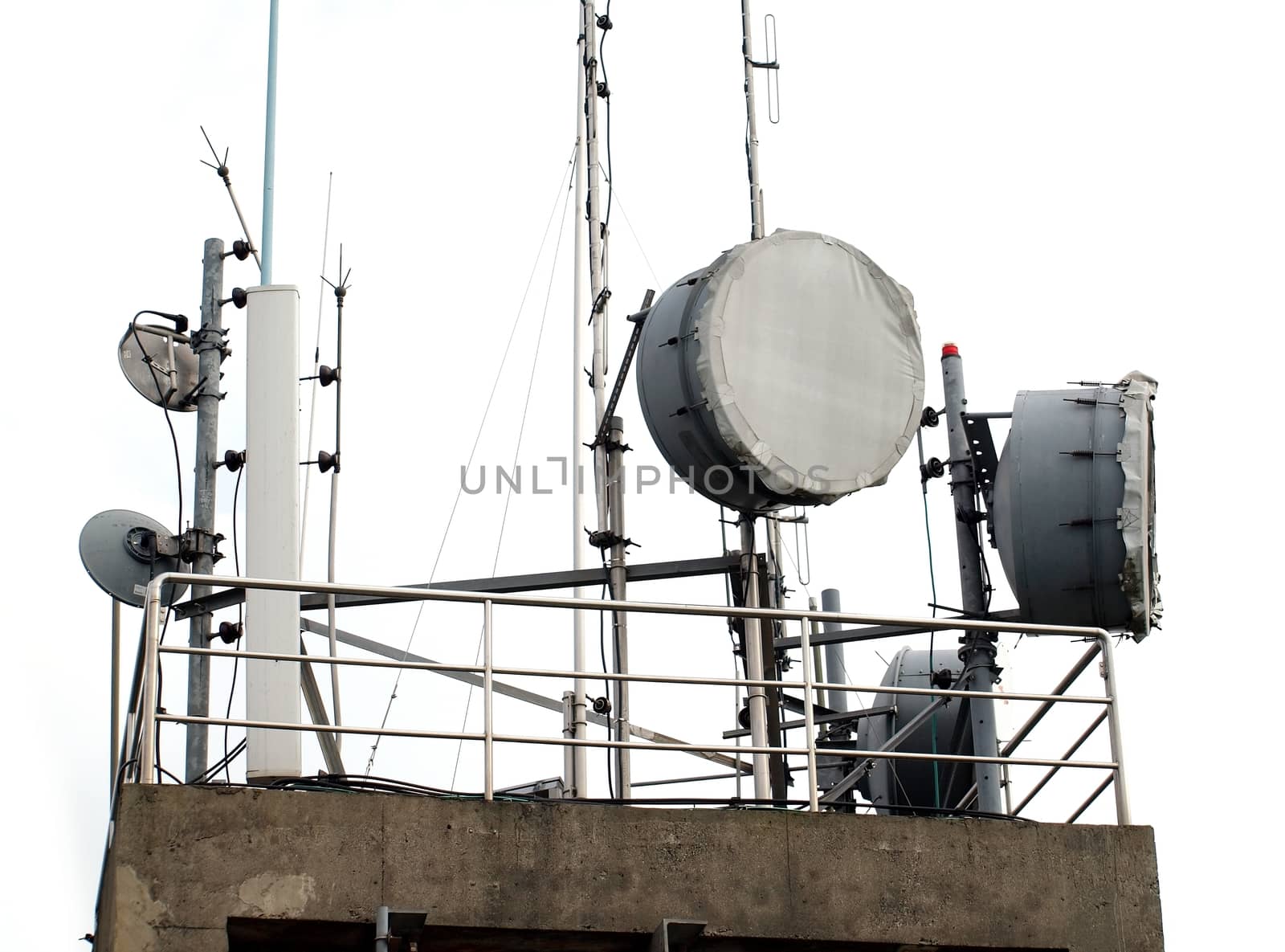 An electronic listening post with satellite and radar devices
