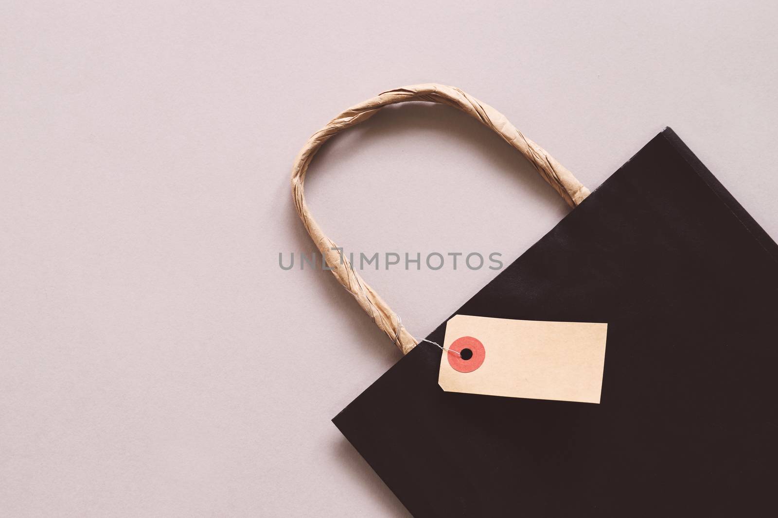 Shopping bag with blank sale tag, copy space,  shopping concept