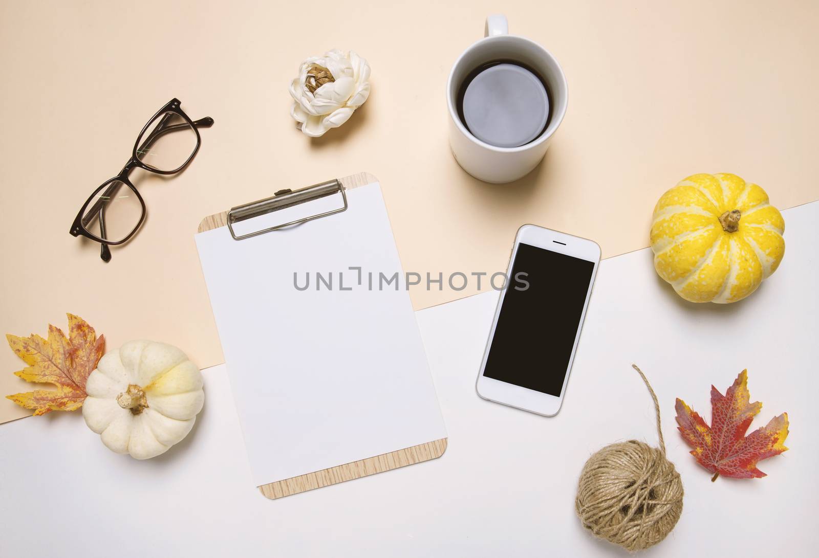 Creative flat lay of workspace desk in autumn style with blank c by nuchylee