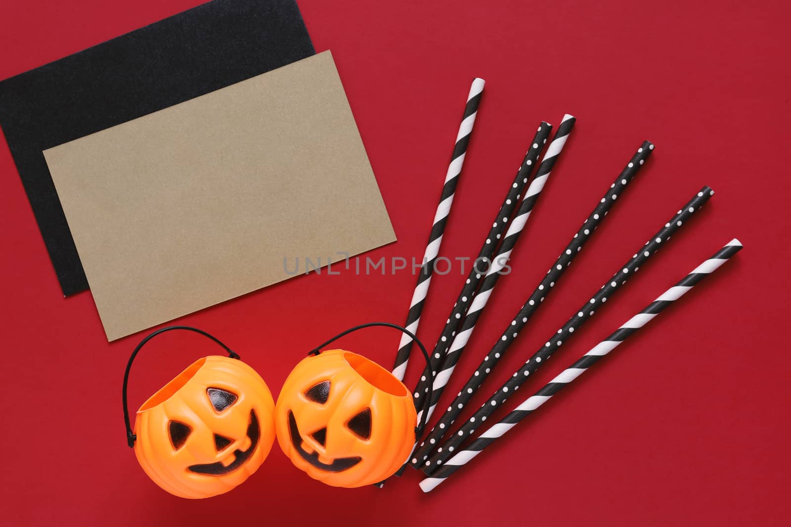 Flat lay style of halloween party concept with decorative pumpki by nuchylee