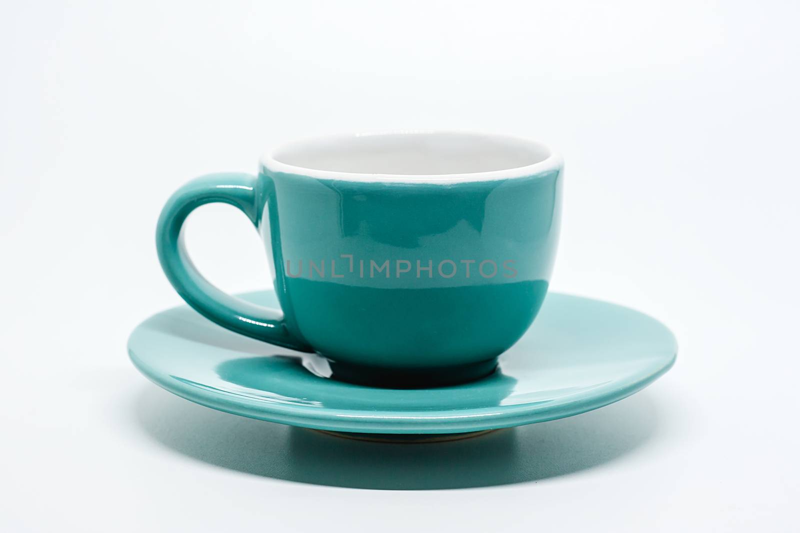 Green coffee cup on white background for drinks and beverage concept