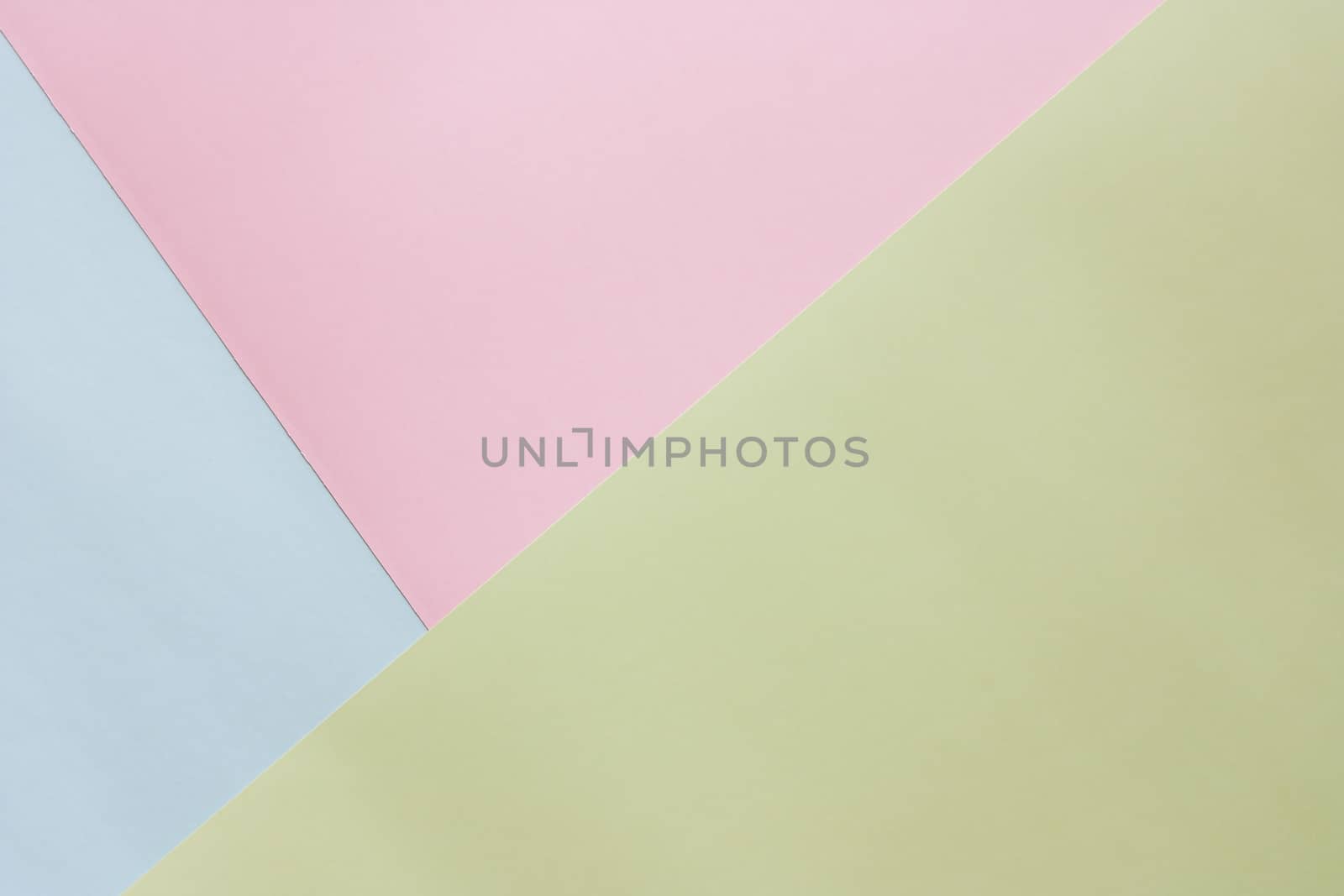 Blue, pink and green pastel colored paper for background