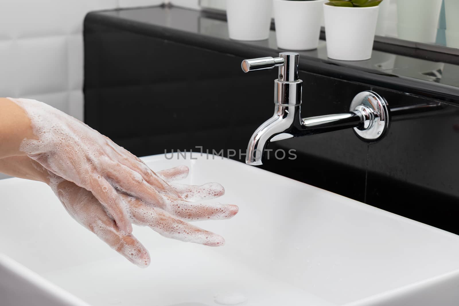 personal hygiene. washing hands, rubbing hand thoroughly with so by asiandelight