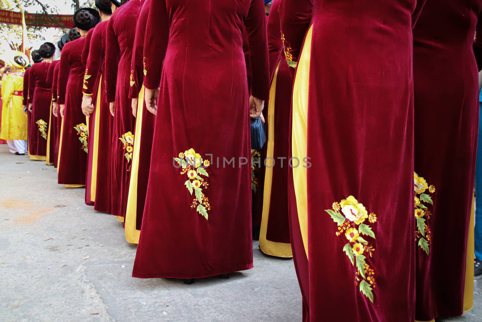 Women called Hoi dong tue wearing festival clothes during a parade for Hoi Phao Dong Ky or Dong Ky Firecracker Festival in Bac Ninh, Vietnam