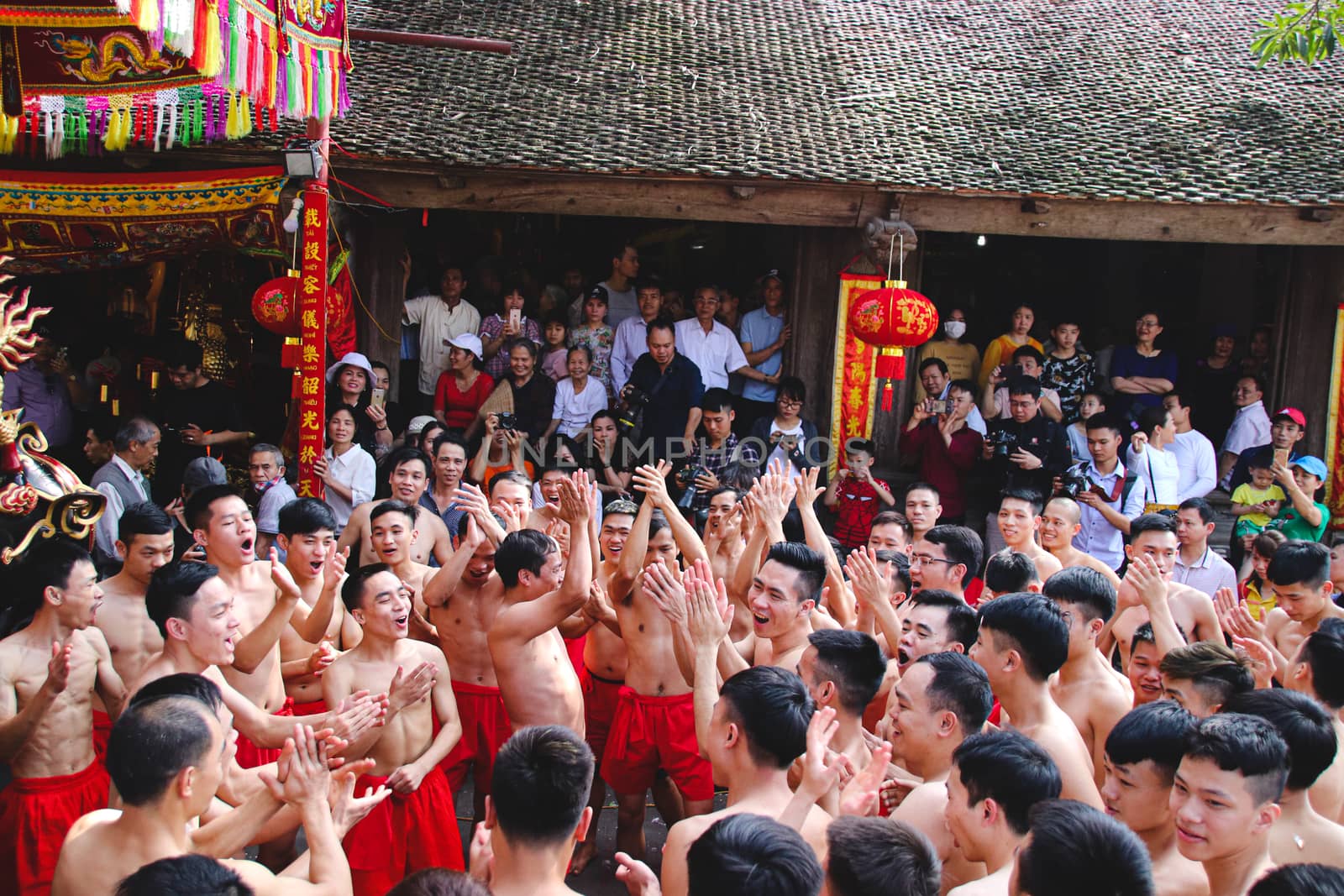 People celebrating the traditional Dong Ky Firecracker Festival or Hoi Phao Dong Ky in Bac Ninh, Vietnam