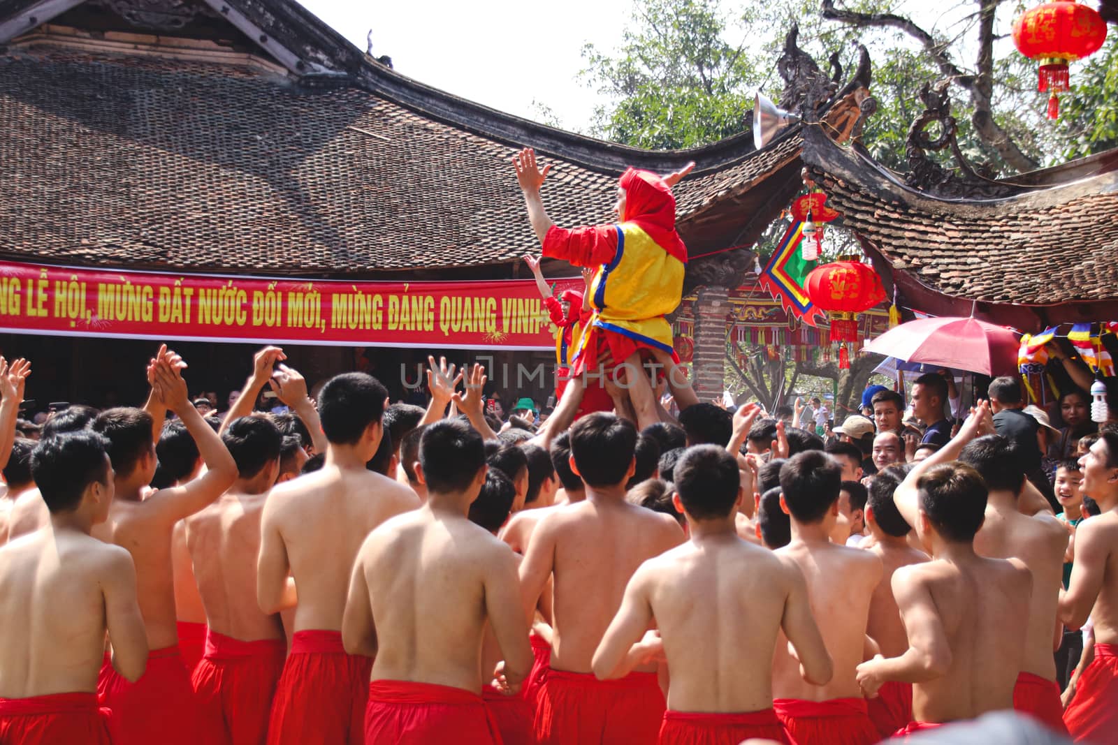 People celebrating the traditional Dong Ky Firecracker Festival or Hoi Phao Dong Ky in Bac Ninh, Vietnam