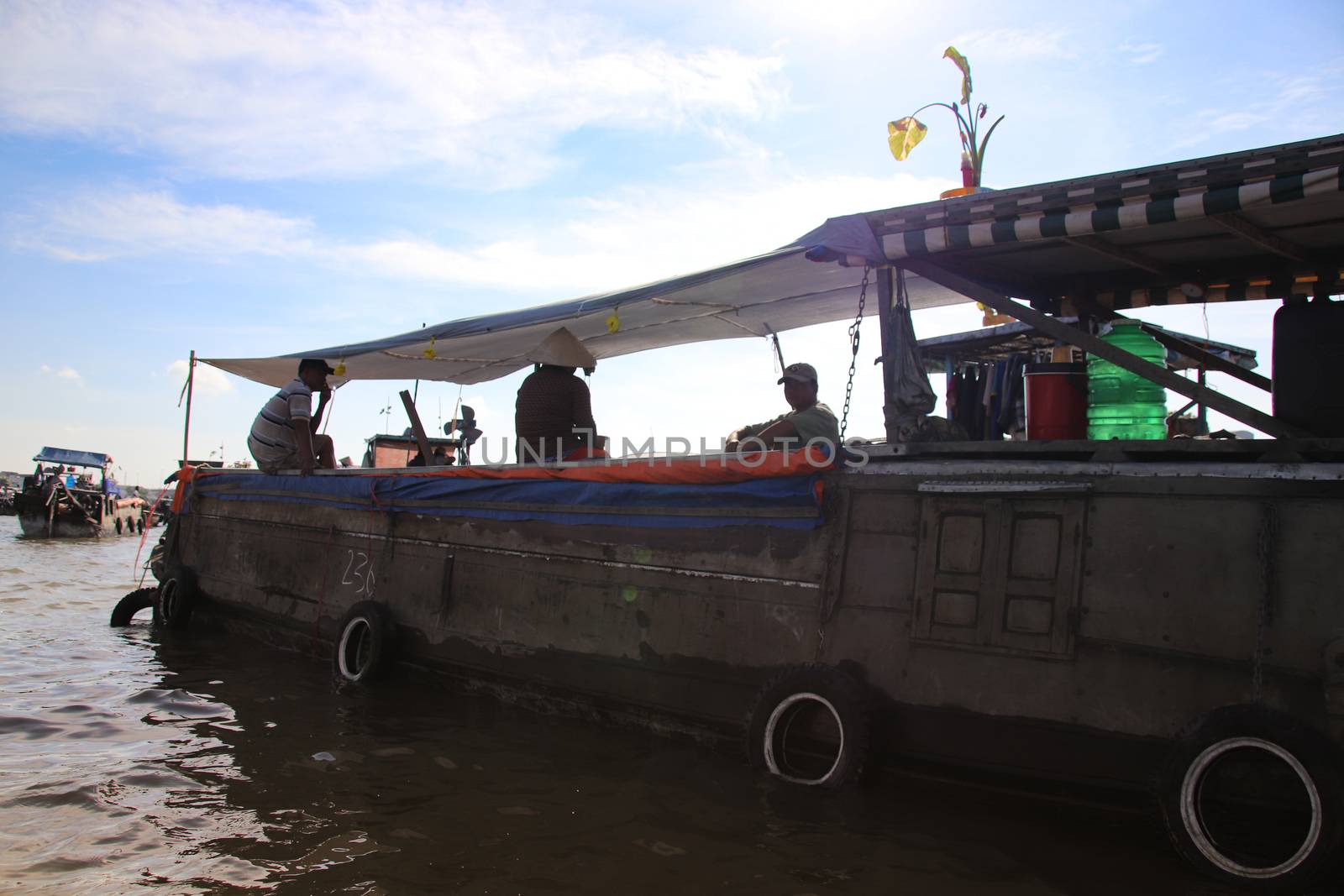 Editorial. Merchant boat in Cai Rang Floating Market by Sonnet15