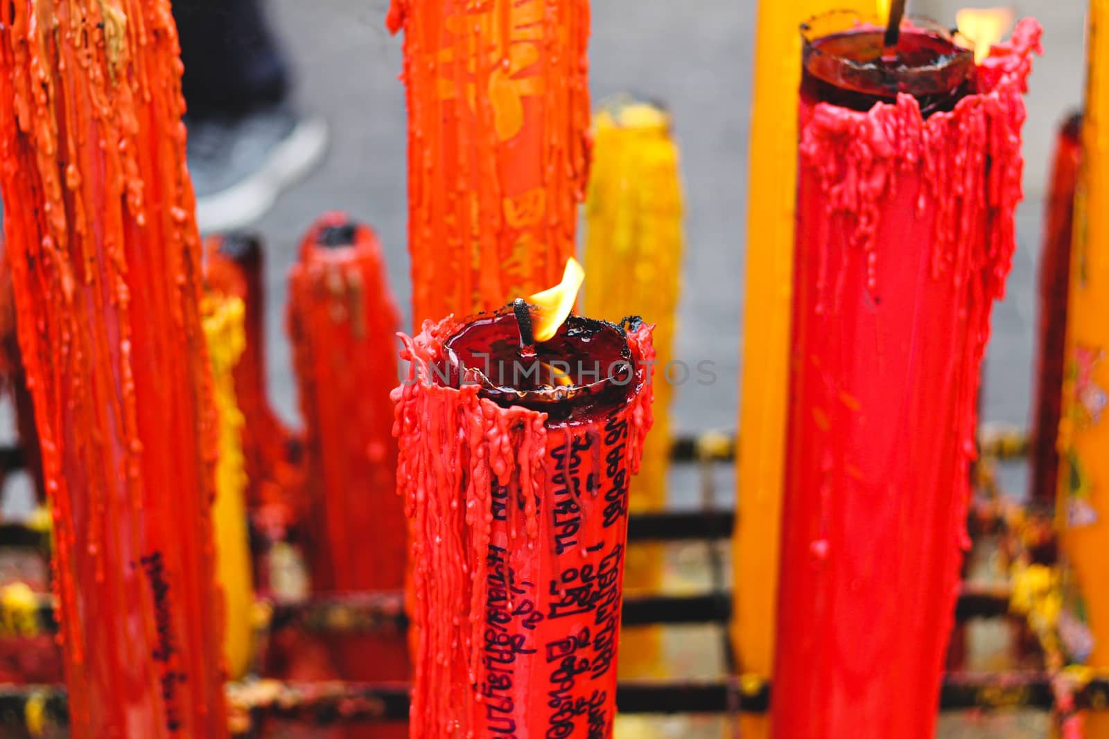 Red candles use as prayer offerings in Chinese tradition during Lunar New Year