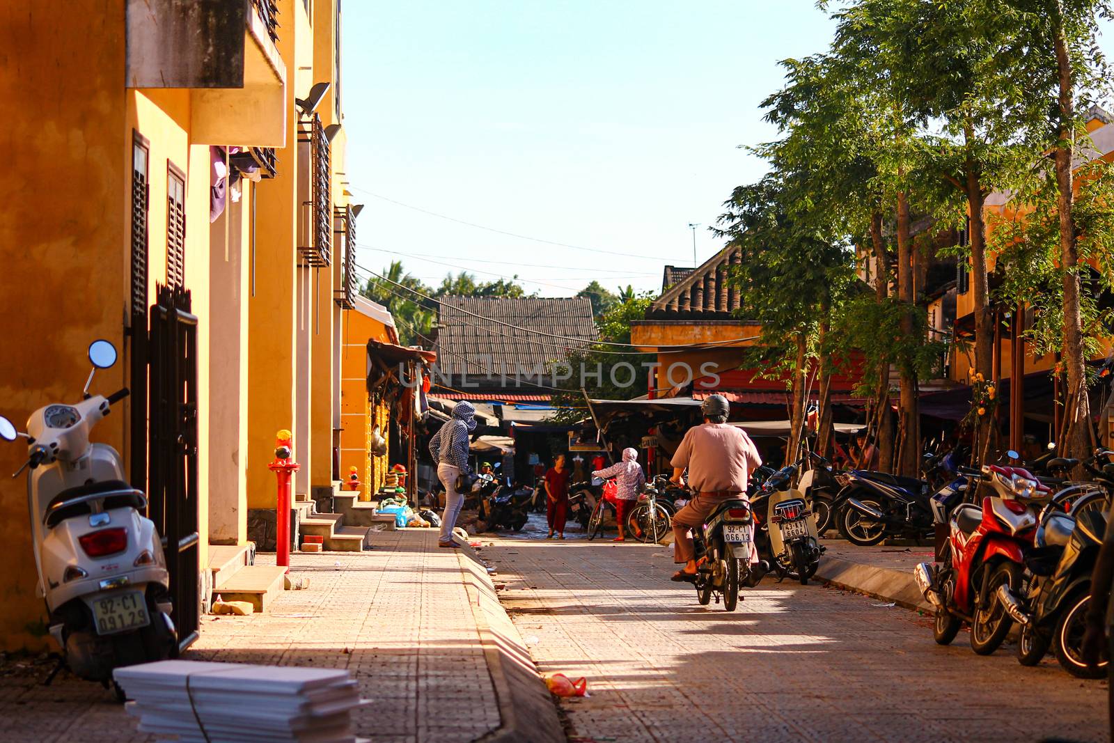 Editorial use only. The rustic street scenery of Ancient Town in Hoi an by Sonnet15