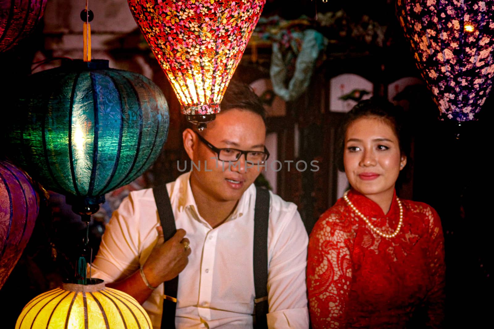 Editorial. Vietnamese Couple Posing for a Photo with the Lanterns by Sonnet15