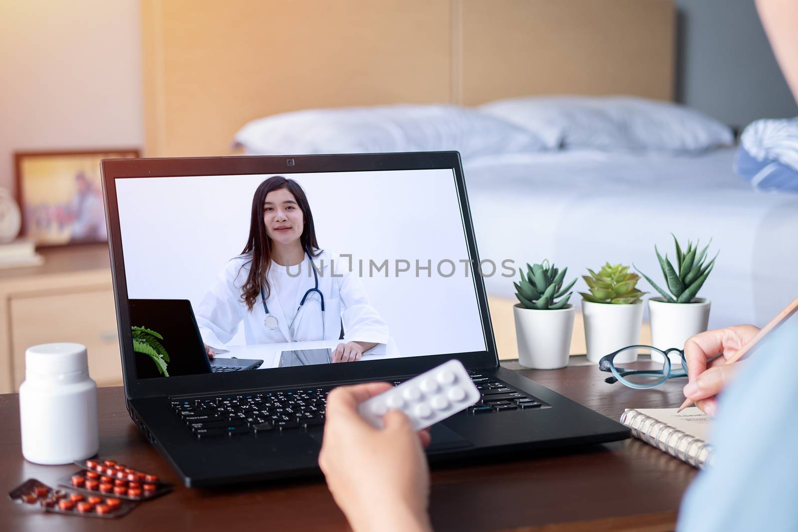 sick woman use video conference, make online consultation with d by asiandelight