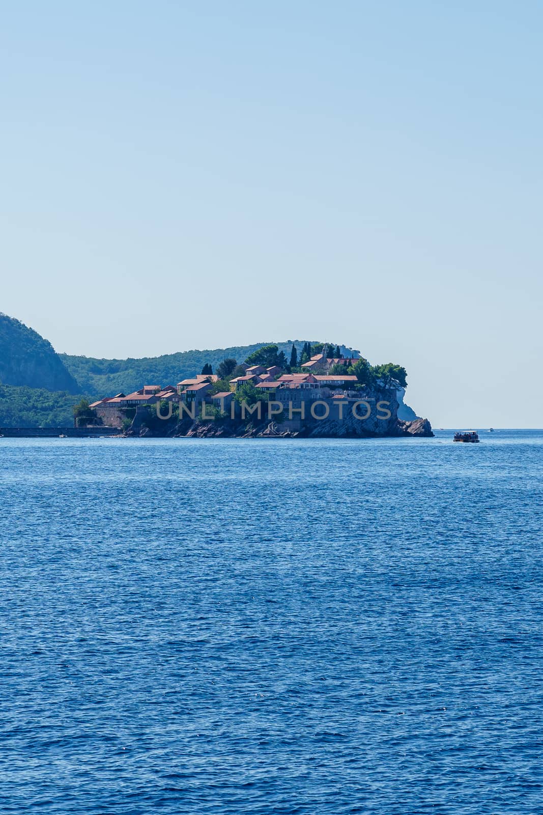 St. Stephen's island off the coast of Montenegro, view from the sea but with a background of water and sky