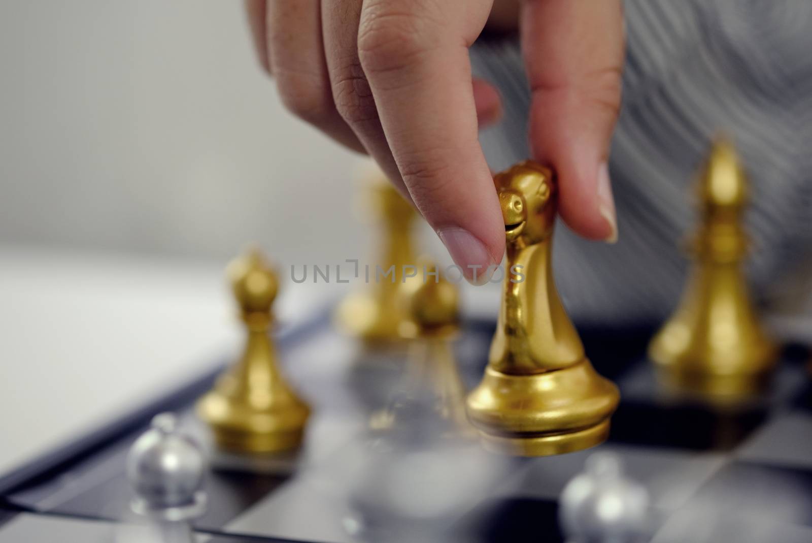 Businessman play with chess game. success management concept of business strategy and tactic challenge