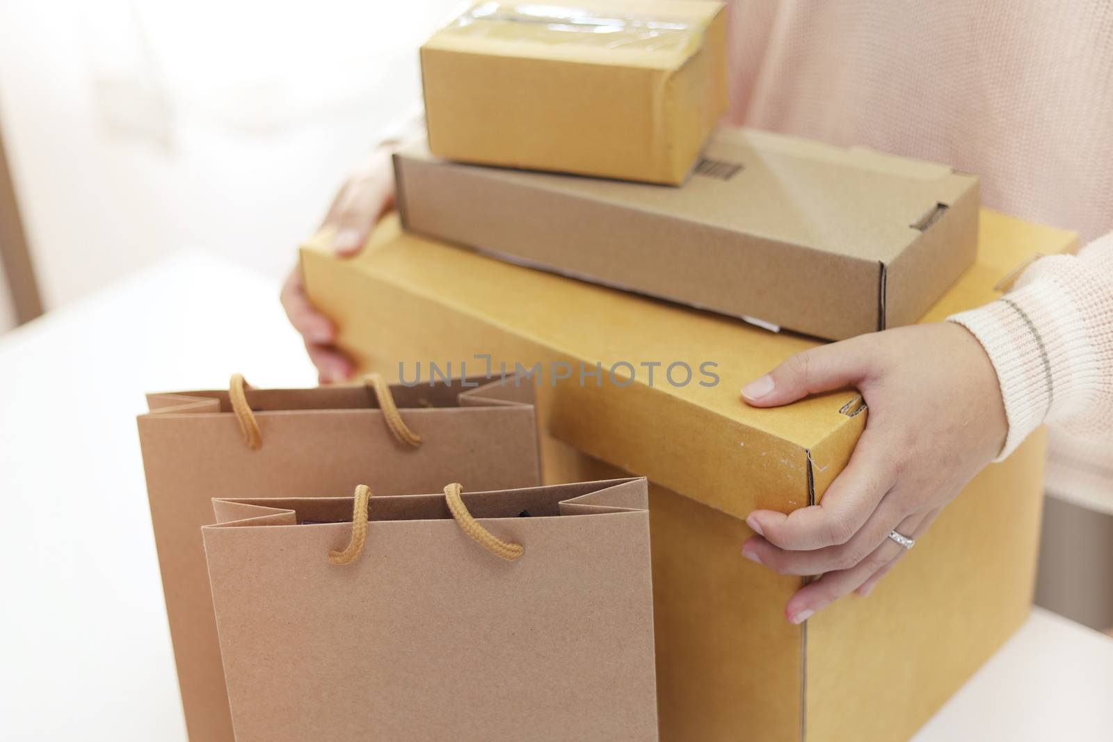 Business From Home woman preparing package delivery box Shipping by peandben