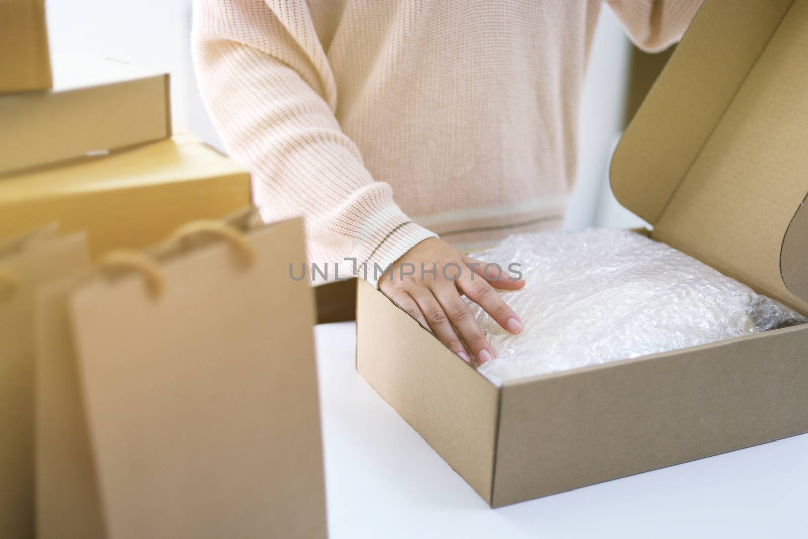 Business From Home woman preparing package delivery box Shipping by peandben