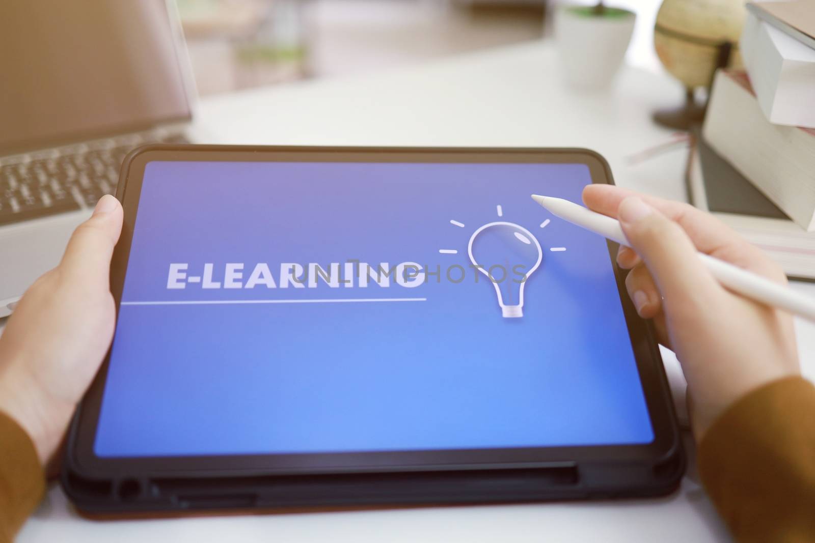 E-Learning concept with website on tablet. Education Internet Technology Web Online