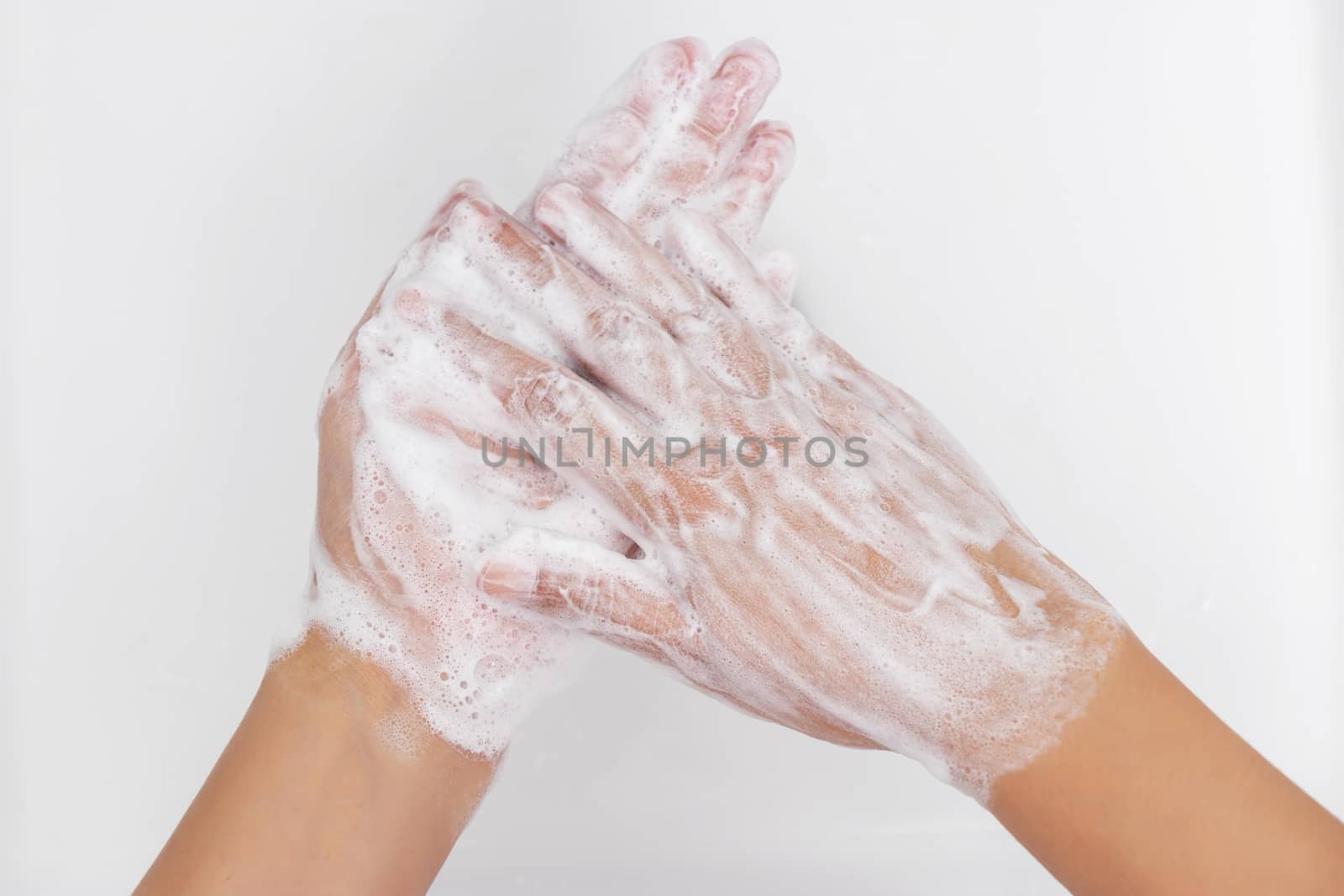 personal hygiene. washing hands, rubbing hand thoroughly with soap that has a lot of bubbles for cleaning and disinfection, prevention of spreading of germs during infections of COVID-19 Coronavirus