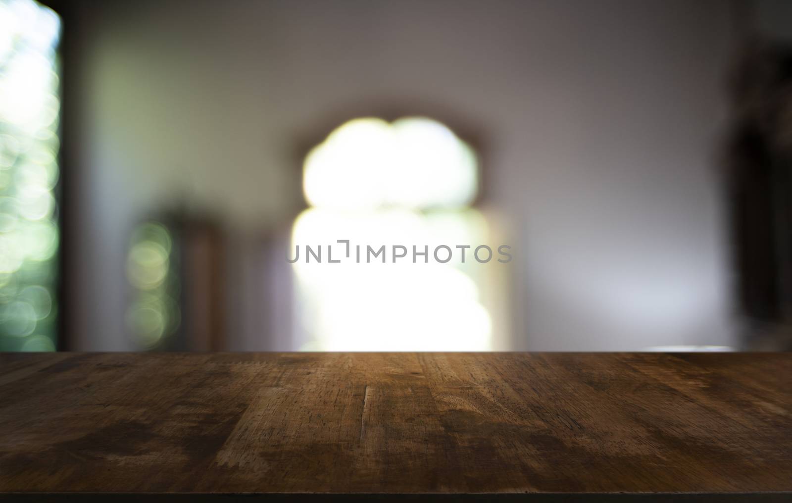 Wood Table Top in Blur Background room interior with empty copy  by peandben