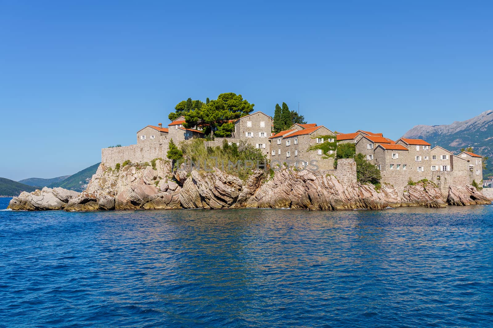 St. Stephen's island off the coast of Montenegro, view from the sea but with a background of water and sky