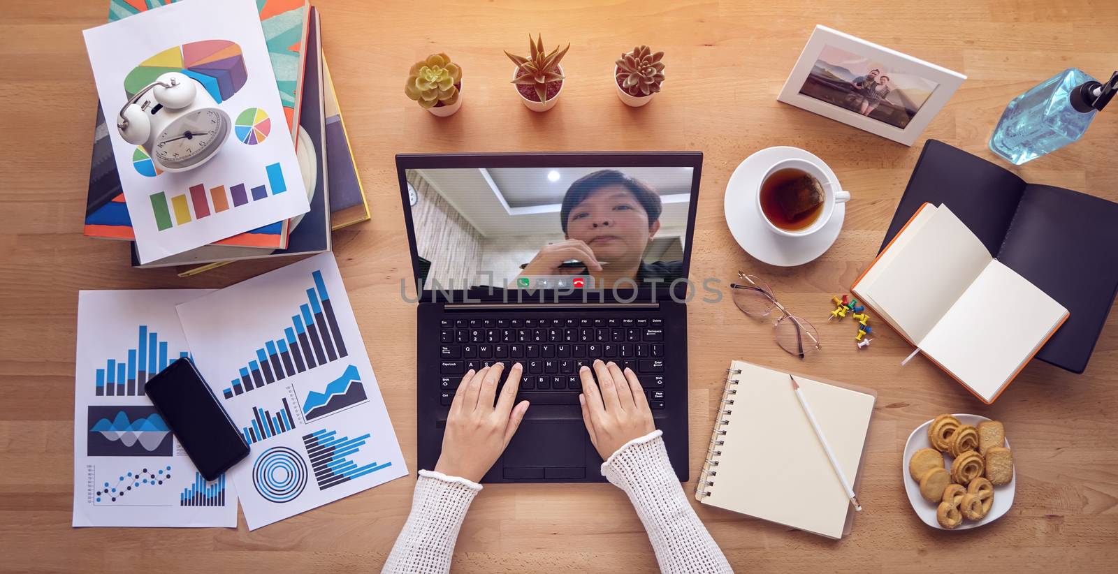 work from home. people make video conference with colleague via laptop computer during self isolation to avoid spreading illness transmission of COVID-19 Coronavirus pandemic. Social distancing