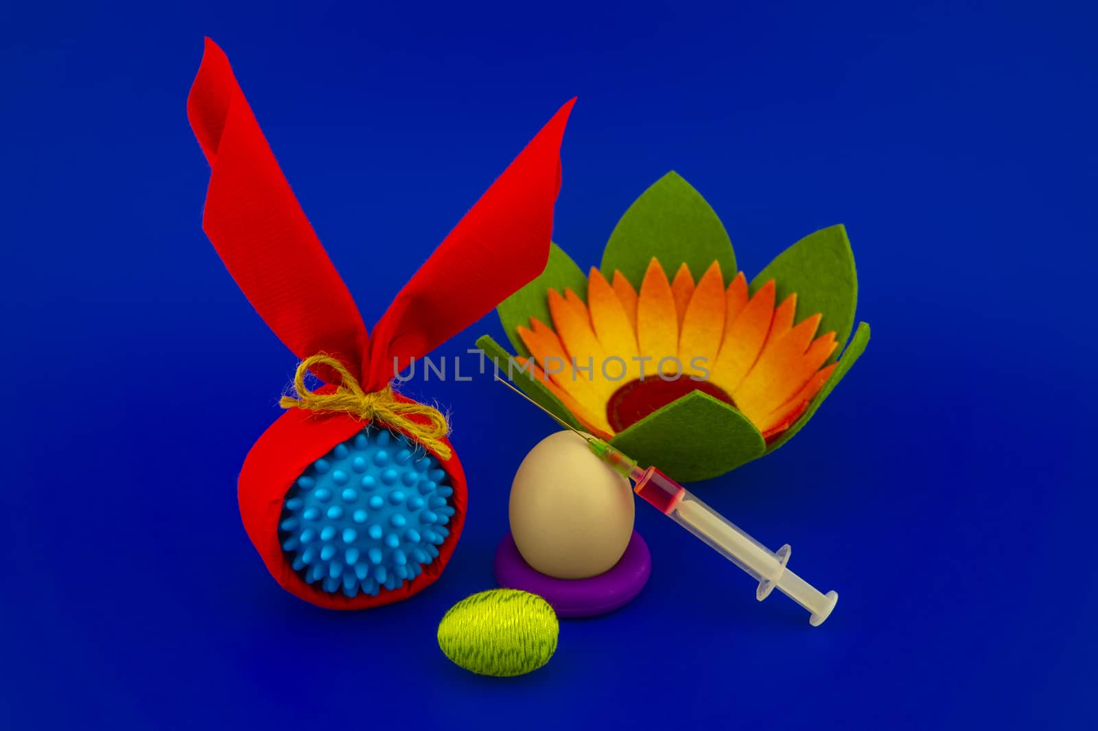 Easter arrangement with eggs and Covid-19 symbol by NetPix