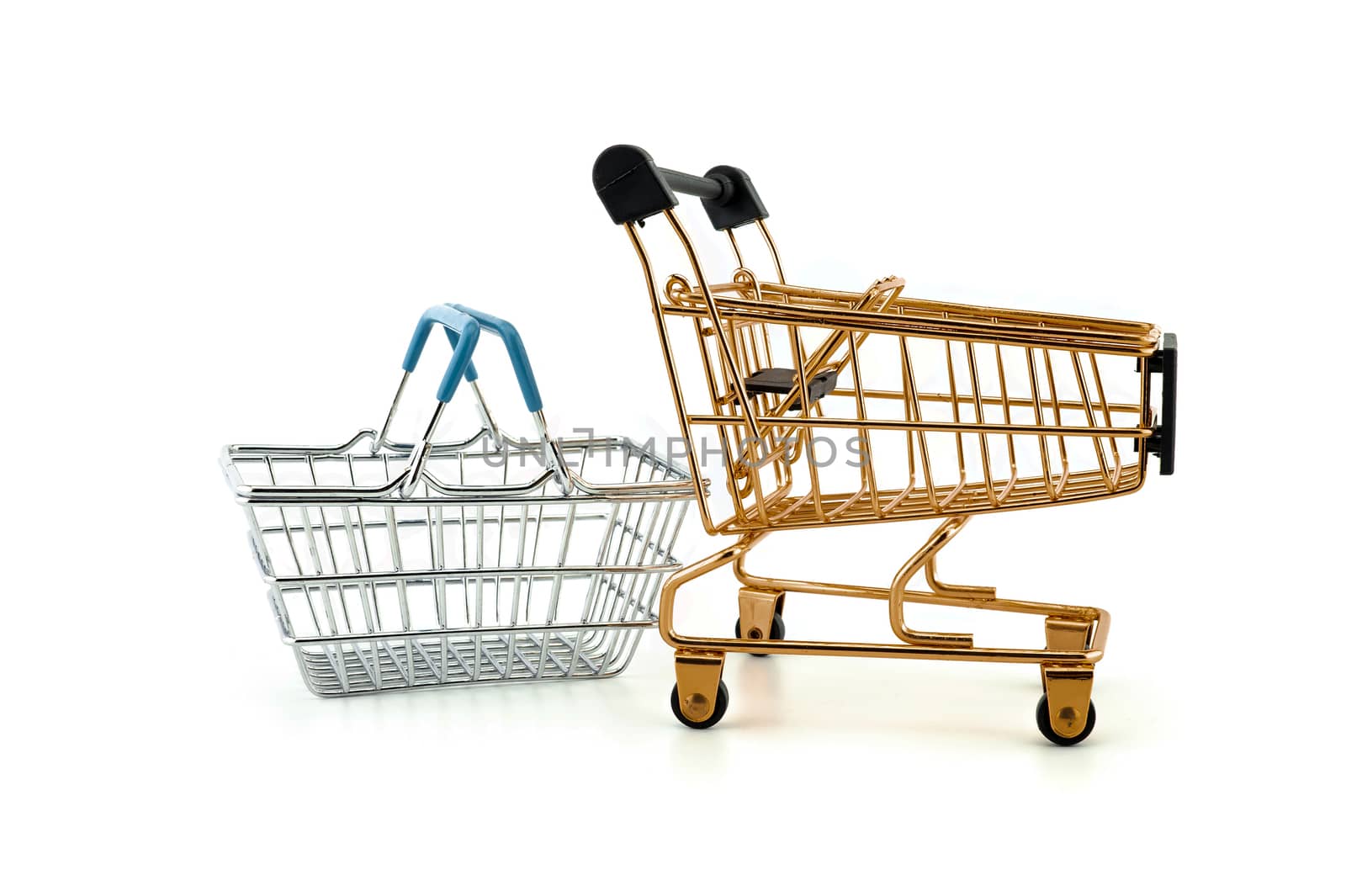 Empty golden shopping cart and wire basket isolated on white background